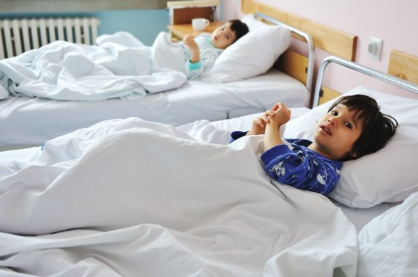Kids in hospital bed